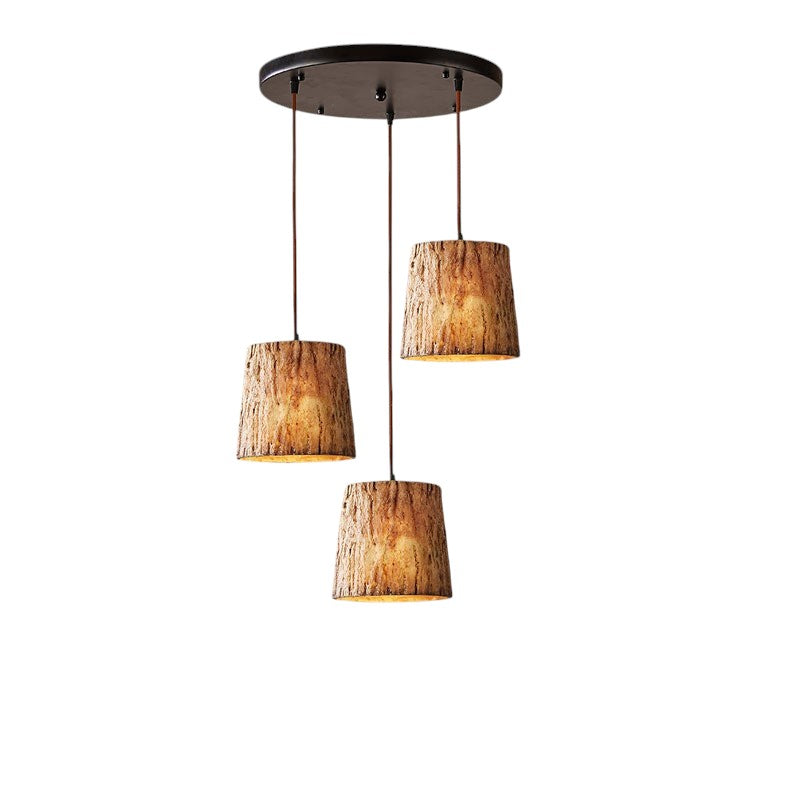 Lámpara colgante de troncos de madera