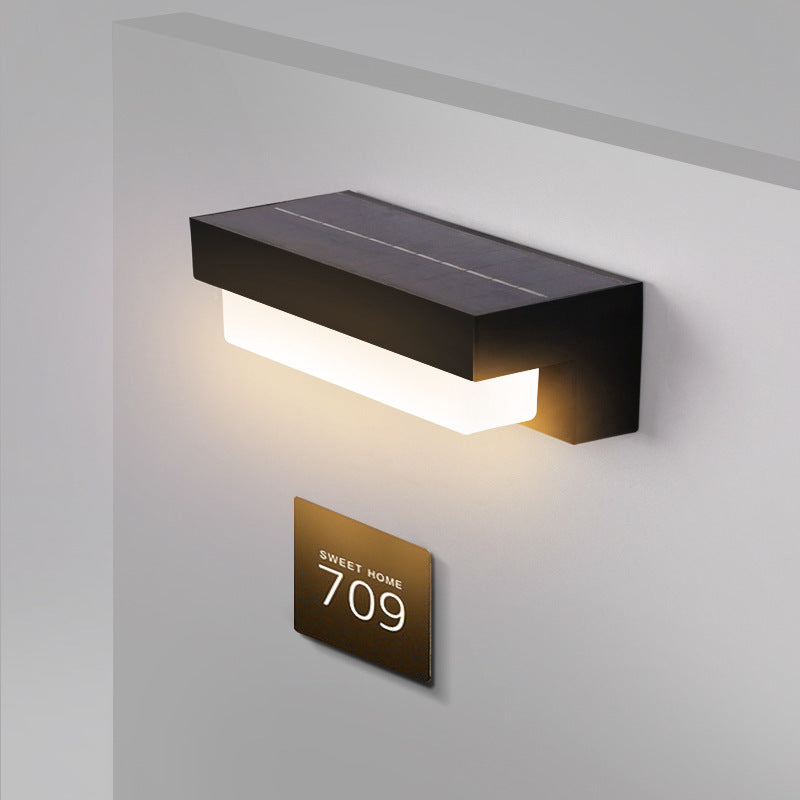 Aplique de pared para exteriores con panel solar